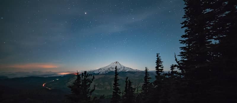Upper Hood River Valley at night with Mount Hood in distance